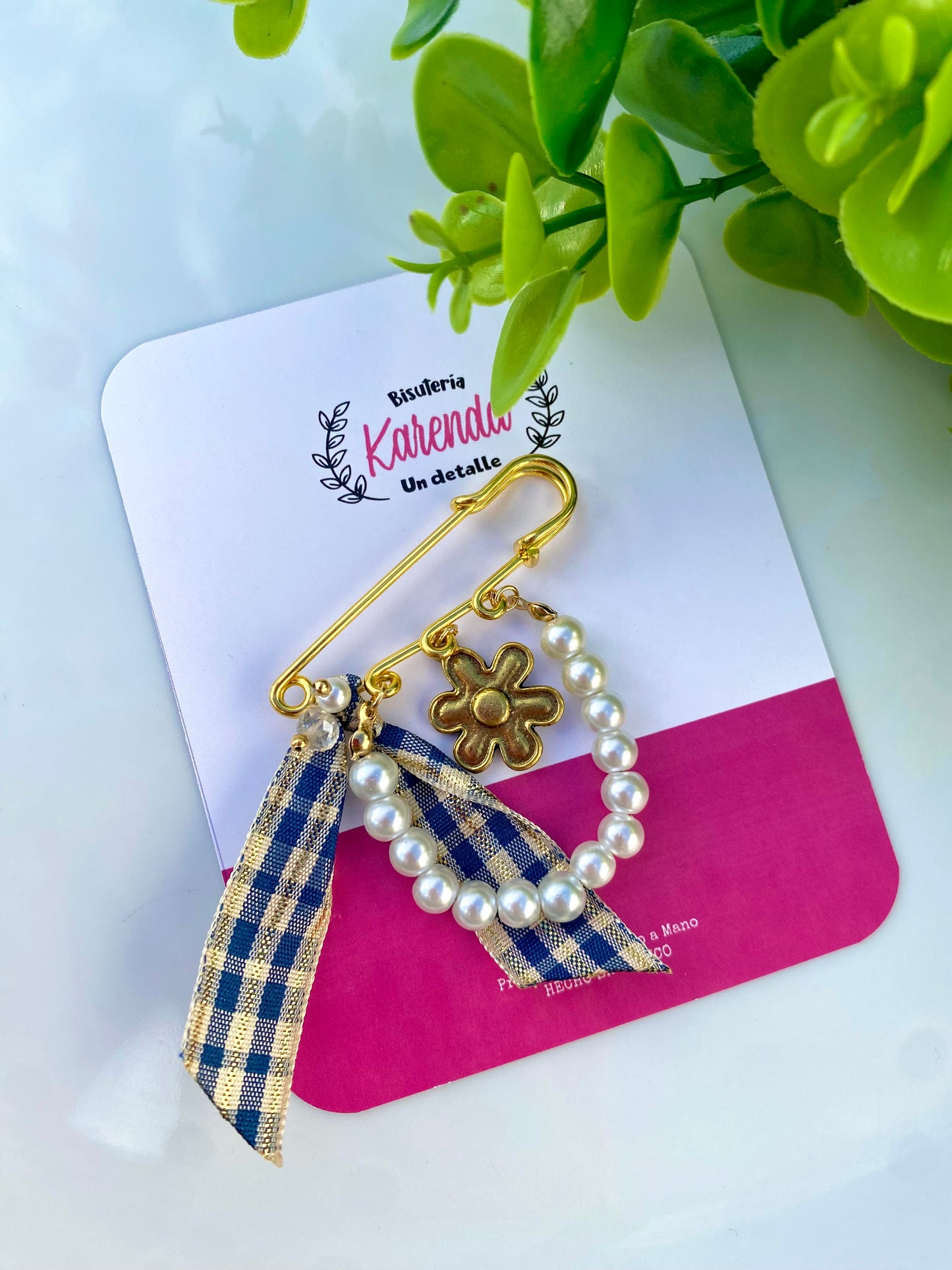 KD21002324- Broche Seguro con moño y perlas