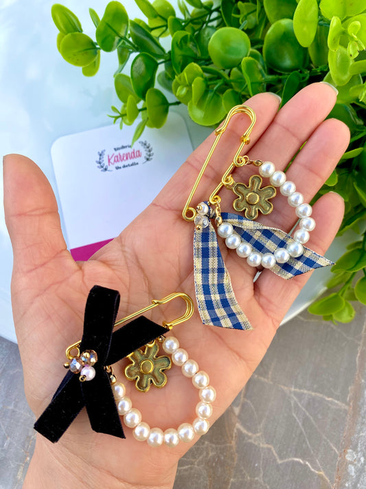 KD21002324- Broche Seguro con moño y perlas