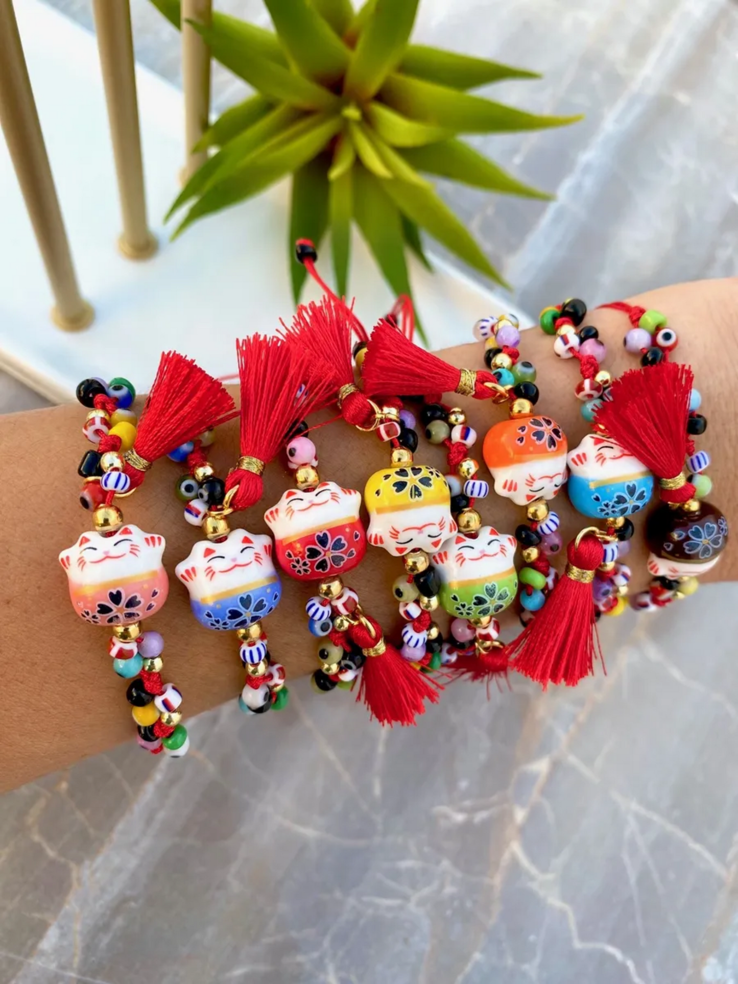 KD090614- Pulsera de Maneki Neko con Ojitos Mini